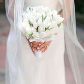 White tulip bouquet symbolizing pure love and new beginnings.