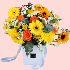Top view of sunflower and gerbera bouquet – Captures the symmetry and fullness of the floral mix.

