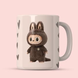 Side view of ceramic mug showing bunny's profile and heart accents