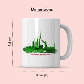  white ceramic mug showing a green silhouette of the Dubai skyline and UAE flag design, with dimensions (9.6 cm high, 8 cm diameter) displayed\