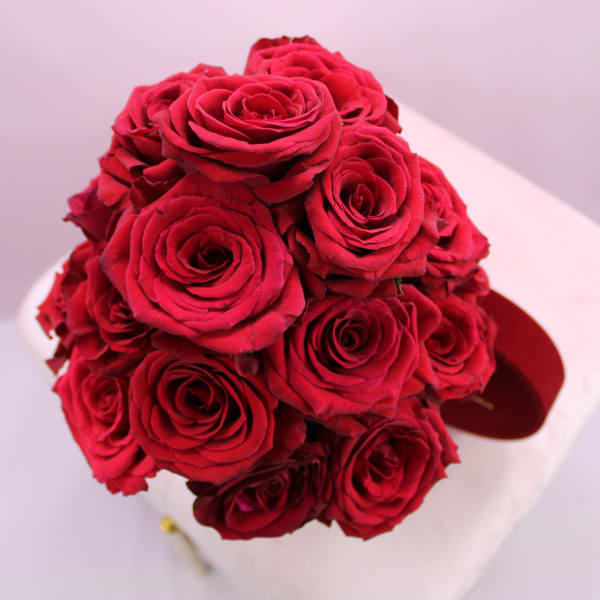 red roses in red velvet box