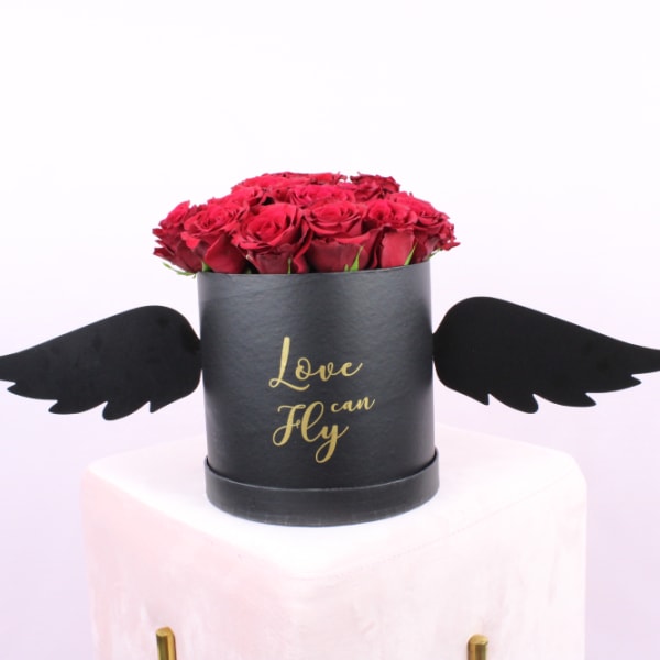 Red Roses in a love can fly box 