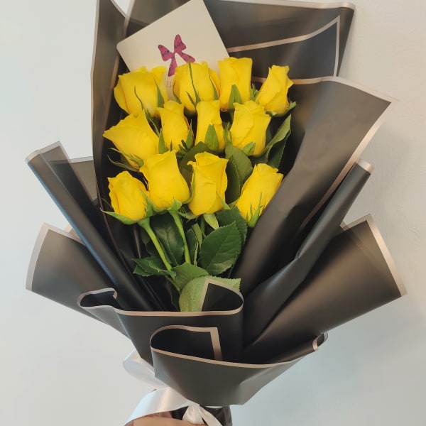 Yellow Roses in black elegant wrapping 