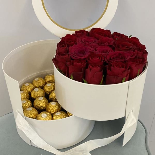 White Round Box of Red Roses and Ferrero Rocher chocolates.