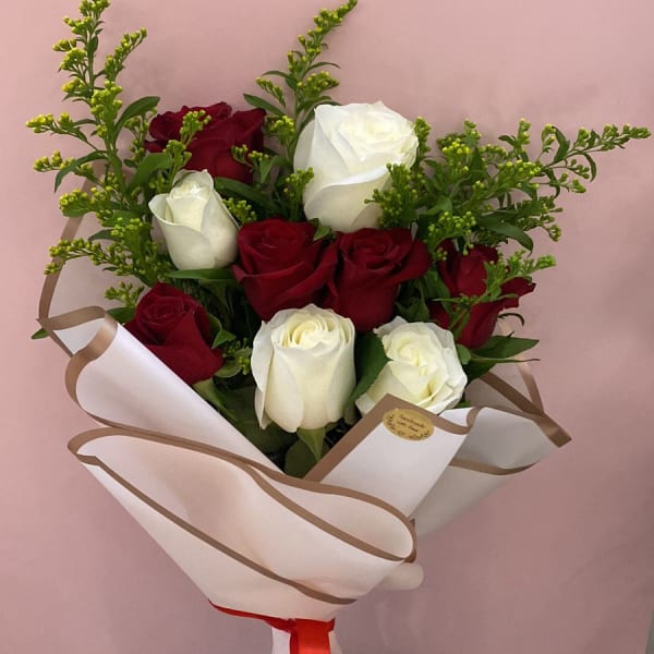 A Bouquet of Red and White Roses with Solidago.