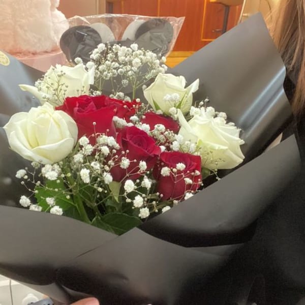 Girl Holding Flower Bouquet