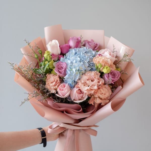 Vibrant floral arrangement with colorful blooms and delicate petals.