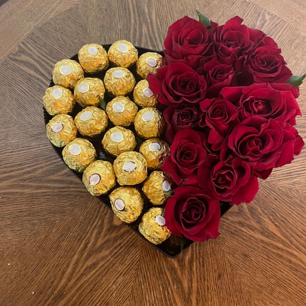 A close-up view of 20 Ferrero Rocher chocolates in a lovely floral arrangement.