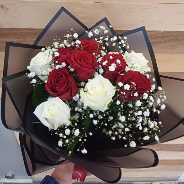 side view of red and white roses