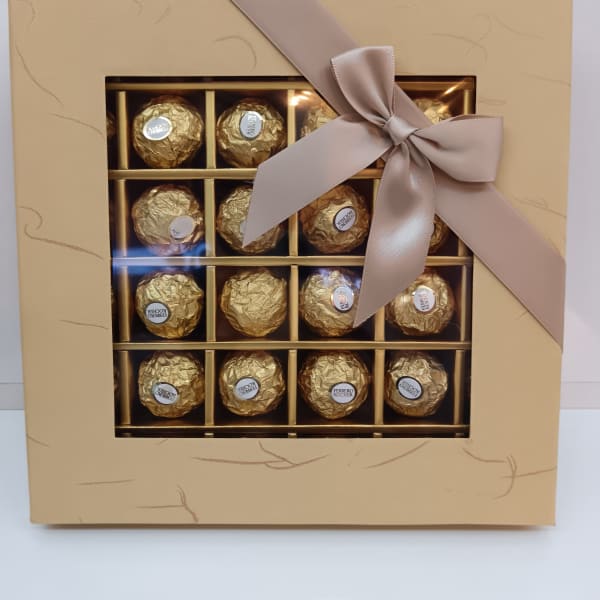 Light brown chocolate box filled with 36 Ferrero Rocher chocolates.