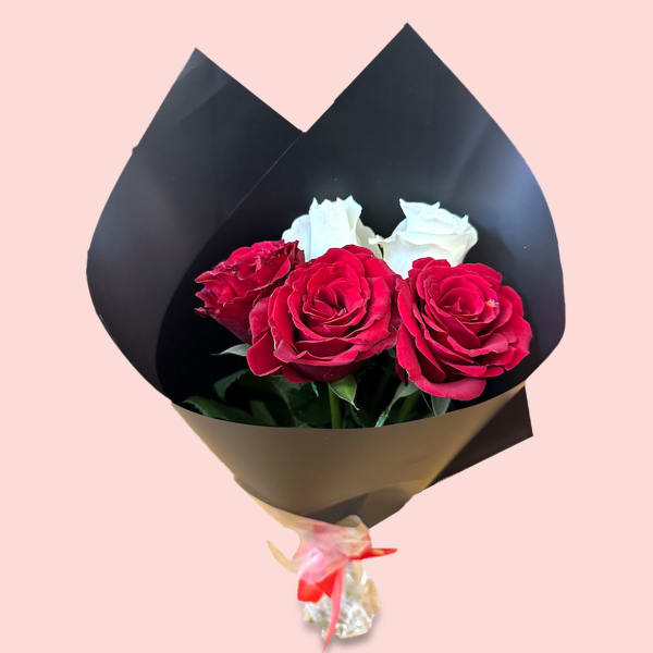 Elegant Eternal Embrace bouquet featuring three red roses and two white roses, wrapped in a luxurious black sheet.