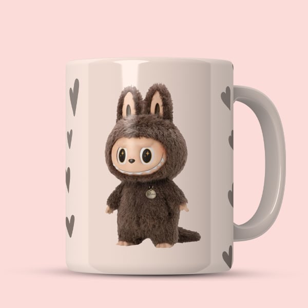 Side view of ceramic mug showing bunny's profile and heart accents