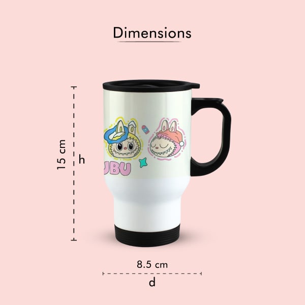 A white travel mug with a black handle and lid, featuring a colorful illustration of a monster character in a blue hat and another in a pink hat with the word 