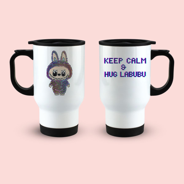 Two white travel mugs with black handles and lids. The left mug shows a colorful, glitch-art style illustration of Labubu, while the right mug displays the text 