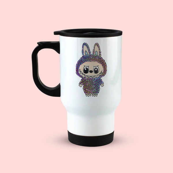 White travel mug with black handle and lid, featuring a colorful, glitch-art style illustration of the character Labubu on the front.