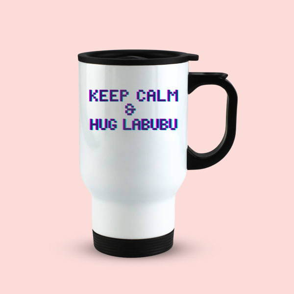 White travel mug with black handle and lid, displaying the text 