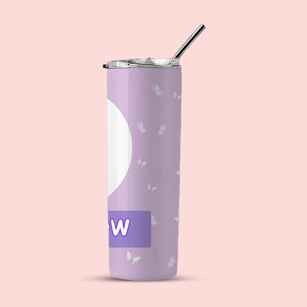 A side view of a light purple tumbler with white butterflies, showing the right portion of the design and the letter 