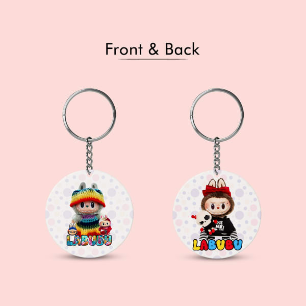 A single, circular plastic keychain featuring a colorful Labubu character wearing a knitted hat. The image highlights the keychain's 6.5cm diameter.

