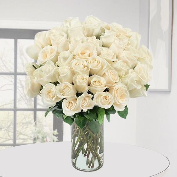 Picture of vase with white roses for birthday gifts.