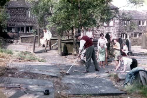 Cleaning the gravestones in the 1980s