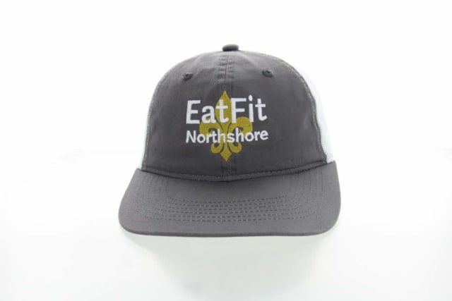 Relaxed golf cap with Eat Fit Northshore logo.