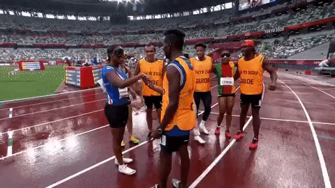 Manuel Antonio Vaz da Veiga gets down on one knee and asks Keula Nidreia Pereira Semedo, for whom he is a guide, to marry him! Fellow athletes clap in the background