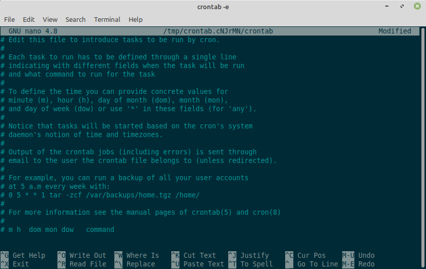 The crontab file open in the nano editor