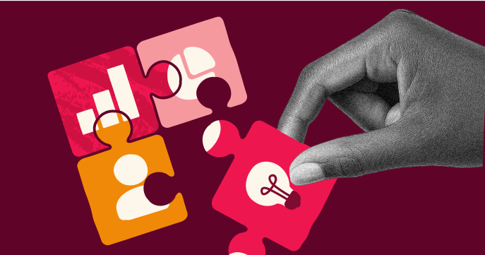 Hand placing puzzle pieces with icons for people, graphs, and connections, representing teamwork and strategic alignment.