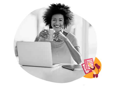 smiling-woman-holding-cup-working-on-laptop, modern-workspace-cozy-atmosphere
