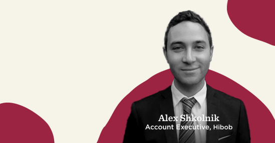 business professional portrait, Hibob Account Executive, casual background, smiling with formal attire and tie