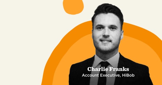 Charlie Franks professional portrait with text overlay as Account Executive at HiBob and abstract orange background., professional portrait, Charlie Franks, HiBob, account executive, abstract background
