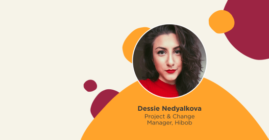 portrait of Dessie Nedyalkova in red shirt, Project & Change Manager at Hibob with abstract colorful background