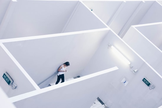 Retaining new parents – why and how? - woman-in-corridor.jpeg