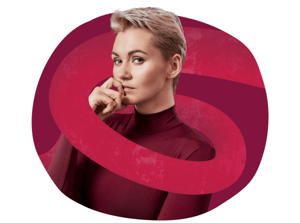 stylish person in maroon turtleneck, posing thoughtfully with finger on chin, against vibrant abstract background, thoughtful expression with short blonde hair and nose ring, highlighting modern fashion and creativity