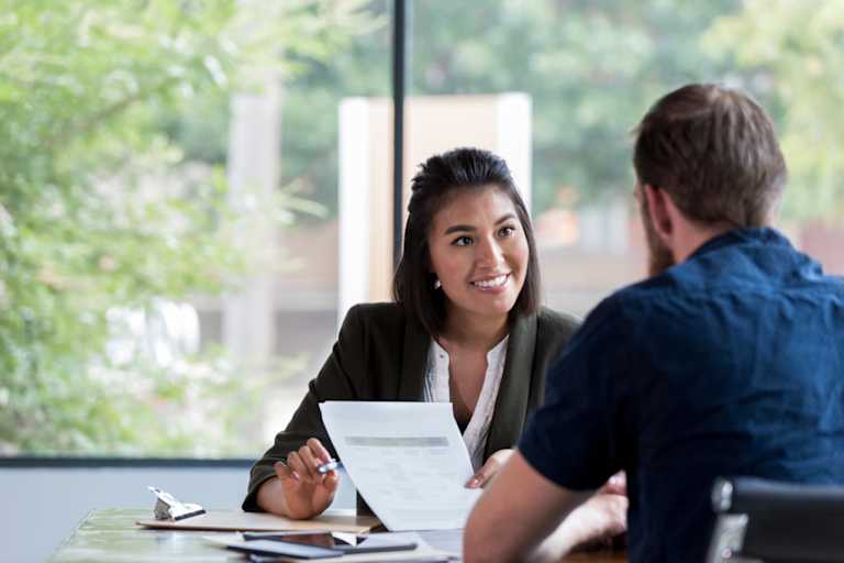 Man and woman in professional meeting