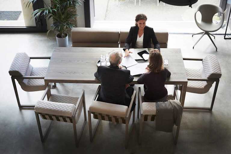 Tax attorney meeting with clients