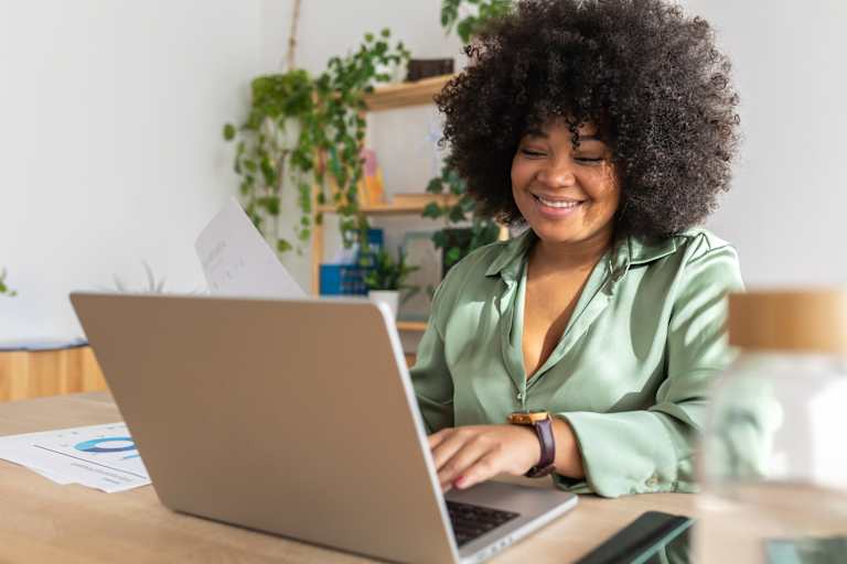 Woman typing on laptop