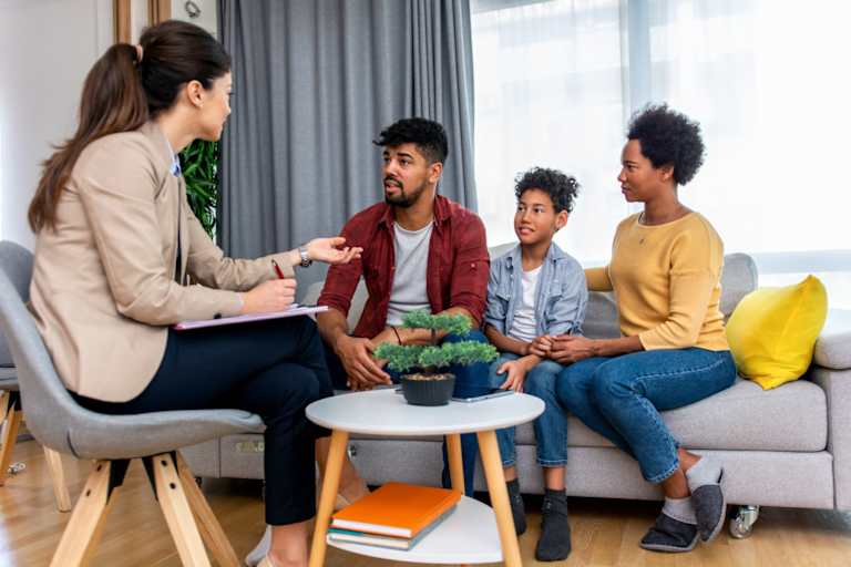 Counselor speaking to a family