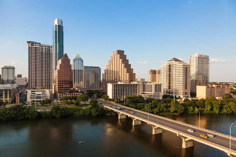 Skyline of Austin, Texas, including Congress Avenue Bridge over Ladybird Lake.