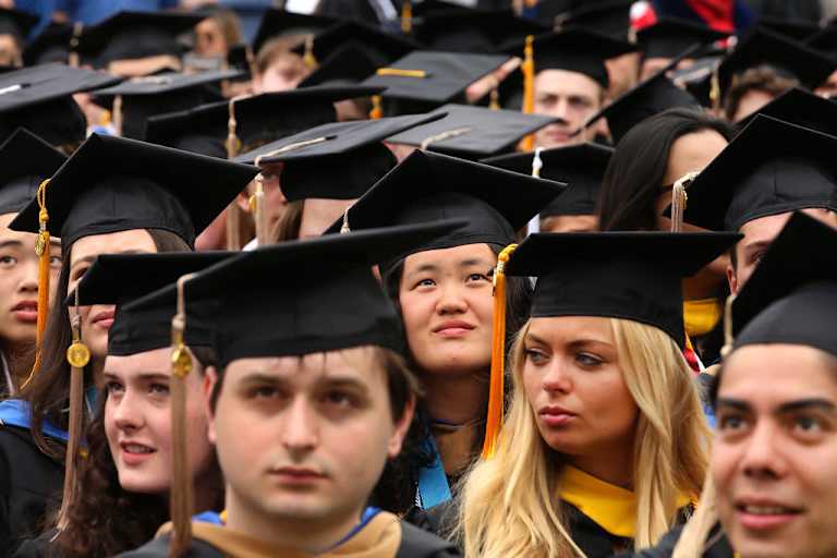 College graduates at commencement