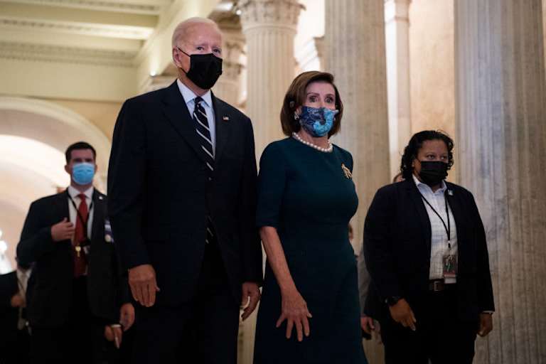 Speaker of the House Nancy Pelosi, D-Calif., walks President Joe Biden out of the U.S. Capitol after a meeting with the House Democratic Caucus on the reconciliation package on Thursday, October 28, 2021.