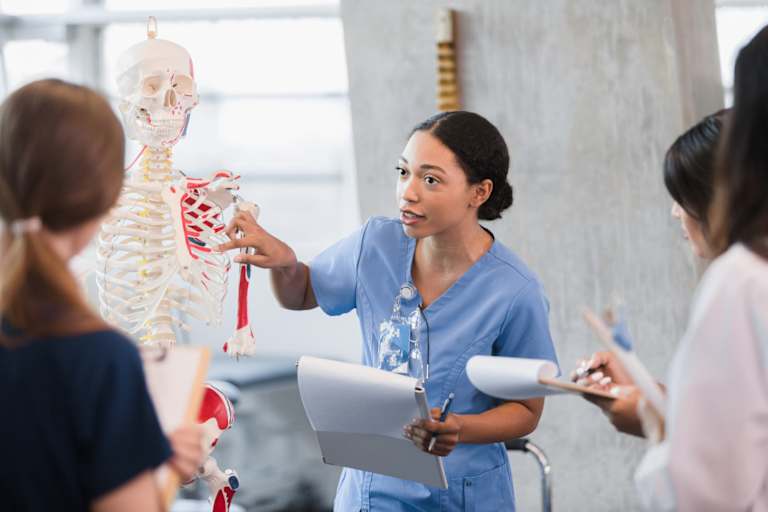 Medical students talking about skeletal system