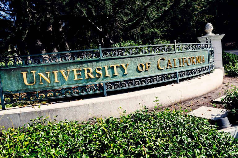 Berkeley, California, USA - October 15, 2016: University of California entrance sign on the corner of Oxford Street and Center Street at Berkeley, California. Over 150 years old, and with many Nobel Prizes winners (they even have reserved parking spots for them), the campus serves almost 40,000 students within an open green space.