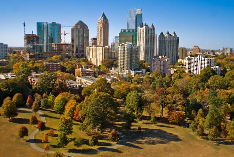 Skyscrapers over Piedmont Park in downtown Atlanta, Georgia, on a sunny fall day.