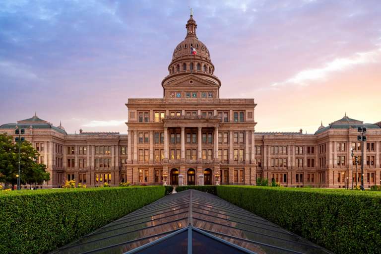 Sunset over the Texas Capitol building in Austin, Texas.