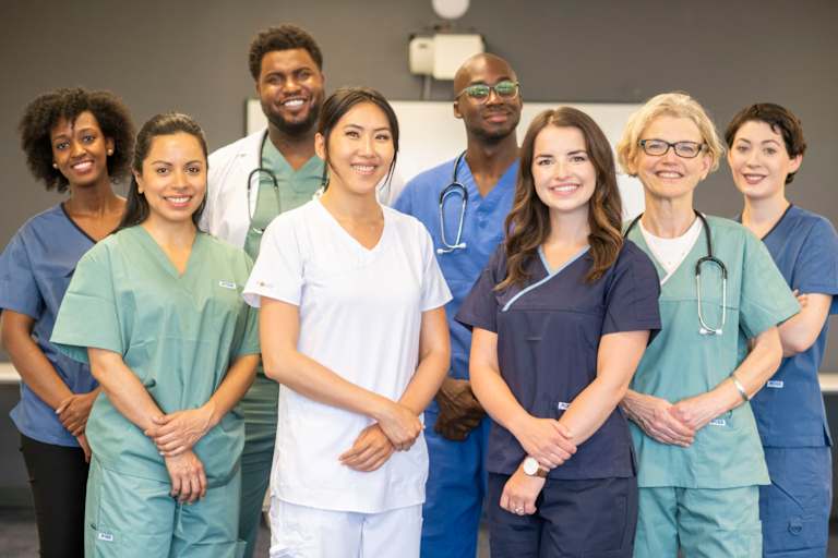 Group of nurse practitioners smiling together