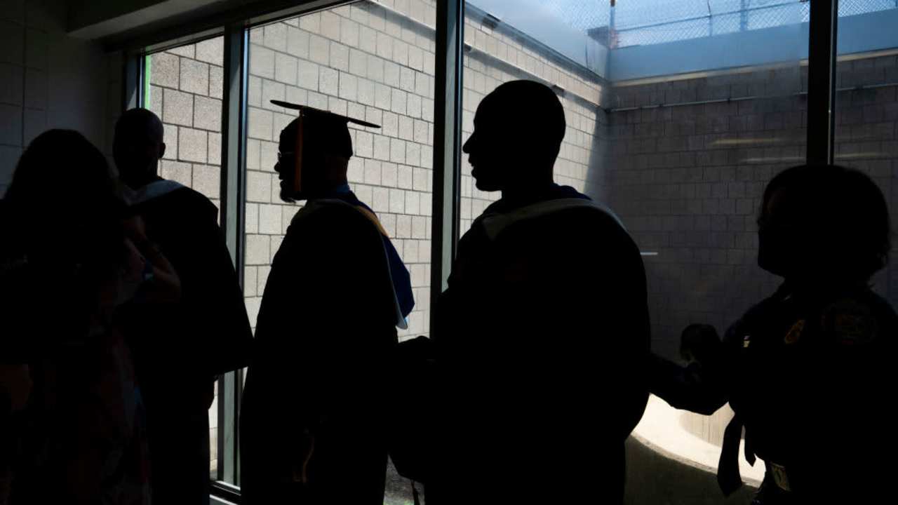JESSUP, MD- May 18 : Graduates of the Goucher Prison Education Program for 2021 and 2022 prepare for the graduation ceremony held at the Maryland Correctional Institution-Jessup in Jessup, MD on May 18, 2022. James Scott, Nyol Robinson, James Jackson and Walter L. McCoy, Jr. received their degrees in American Studies from Goucher College while serving time in prison. It is about finally feeling like your voice is heard, Goucher Prison Education Program and Goucher College alumnus William Freeman III said of the program. We are no longer inmates. We are people. (Photo by Carolyn Van Houten/The Washington Post via Getty Images)