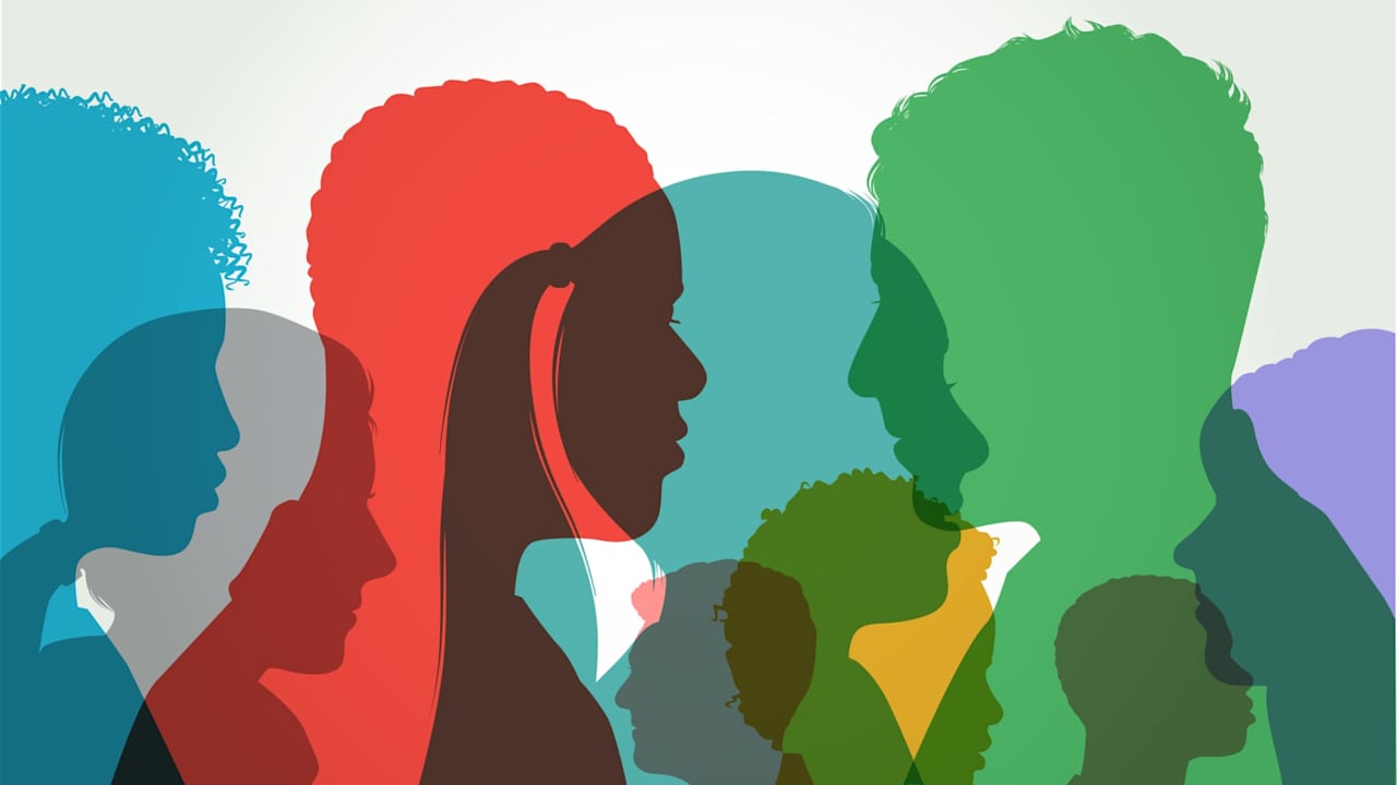 Colourful overlapping silhouettes of head profiles.