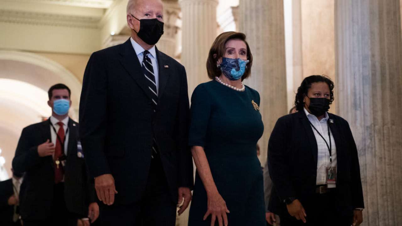 Speaker of the House Nancy Pelosi, D-Calif., walks President Joe Biden out of the U.S. Capitol after a meeting with the House Democratic Caucus on the reconciliation package on Thursday, October 28, 2021.
