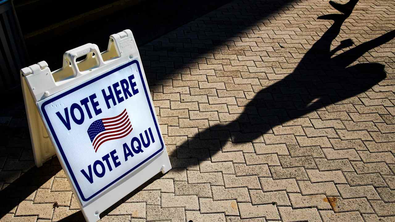 A vote here sign outside a polling location in Miami Beach, Florida